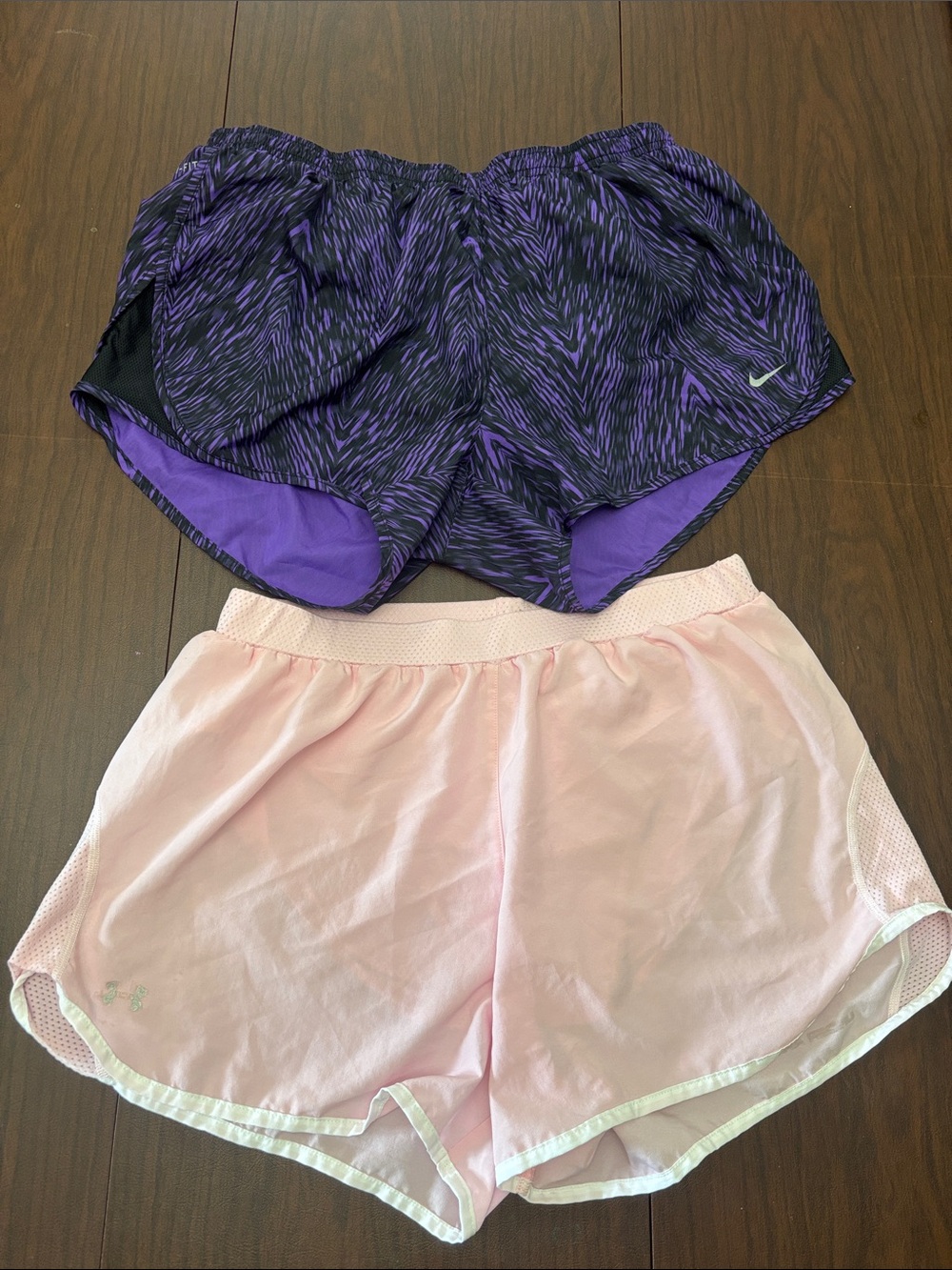 Nike Purple Patterned and Under Armour pale pink running shorts